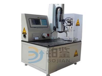 Vertical spring torsion test machine